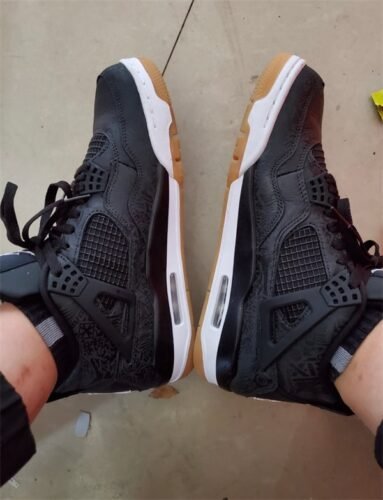 Click to view full screen Air Jordan 4 Retro KAWS Black 930155-001 photo review